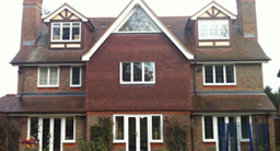 Double Character Dormer Loft Conversion with Triangular Gable Window